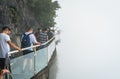 Tourists on a glass walk in China Royalty Free Stock Photo