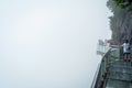 Tourists on a glass walk in China