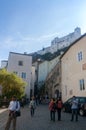 Tourists go down the street to Hohensalzburg Castle High Salzbu