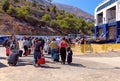 Tourists go to the Blue Star sea ferry on Symi Island