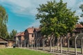 Oswiencim, Poland - September 21, 2019: Tourists going trought the gate of the nazi concentration camp of Auschwitz