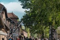 Oswiencim, Poland - September 21, 2019: Tourists going trought the gate of the nazi concentration camp of Auschwitz