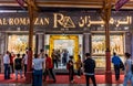 Tourists at the gold shop in Gold Souk in Deira in Dubai, United Arab Emirates. One of the most popular shopping destinations and Royalty Free Stock Photo