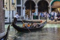 Tourists in a gondola, Venice, Italy Royalty Free Stock Photo