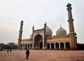 Tourists in the grounds of the Jama Masjid Mosque