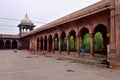 Tourists in the grounds of the Jama Masjid Mosque