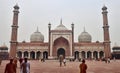 Tourists in the grounds of the Jama Masjid Mosque