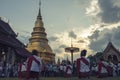 Tourists and groups of female dancers dancing in the area of Wat Phra That Haripunchai, Lamphun Province