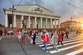 Tourists and guests of St. Petersburg on the spit of Vasilyevsky island