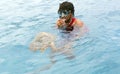 A tourists guide showing a turtle in the sea