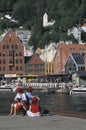 Tourists at the harbour facing Bryggen, Bergen, Norway. Royalty Free Stock Photo