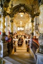 Tourists have afternoon tea in golden hall in New York Cafe in Budapest Royalty Free Stock Photo