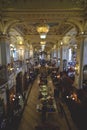 Tourists have afternoon tea in golden hall in New York Cafe in Budapest Royalty Free Stock Photo