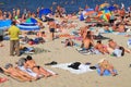 Tourists have a rest on the sandy beach