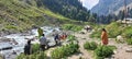 Tourists having fun time by the Sheshnag river in Chandanwari