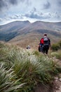 Tourists on the high mountain meadows