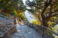 Tourists hike in Samaria Gorge in central Crete Royalty Free Stock Photo
