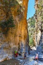 Tourists hike in Samaria Gorge in central Crete, Greece. The national park is a UNESCO Biosph