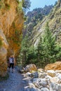 Tourists hike in Samaria Gorge in central Crete, Greece. The national park is a UNESCO Biosph