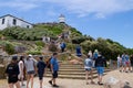 Tourists hiking to the lighthouse on top of Capepoint