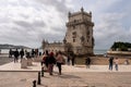 Tourists at the historic 16th-century Belem Tower