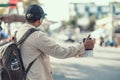 Tourists hold maps and hitchhiking. backpacker and travel concept