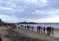 tourists holidaying and enjoying at Kovalam beach, Kerala