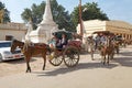 Tourists horse-drawn taxis in Bagan, Myanmar