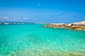 Tourists in Illetes beach Formentera island, Mediterranean sea, Royalty Free Stock Photo