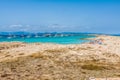 Tourists in Illetes beach Formentera island, Mediterranean sea, Royalty Free Stock Photo