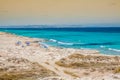 Tourists in Illetes beach Formentera island, Mediterranean sea, Royalty Free Stock Photo