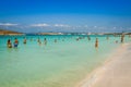 Tourists in Illetes beach Formentera island, Mediterranean sea, Royalty Free Stock Photo