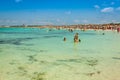 Tourists in Illetes beach Formentera island, Mediterranean sea, Royalty Free Stock Photo