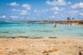 Tourists in Illetes beach Formentera island, Mediterranean sea, Royalty Free Stock Photo