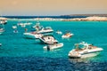 Tourists in Illetes beach Formentera island, Mediterranean sea, Royalty Free Stock Photo