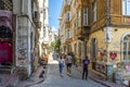 A couple walking on a typical street in the Karakoy district of Istanbul Turkey