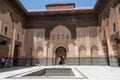 Tourists in inner courtyard of Medersa of Ben Youssef, Marrakech,Morocco