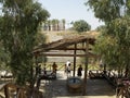 Tourists in the Jordanian area of the Jordan River the site of the baptism of Jesus Christ in Bethany along the Jordan River. Jord