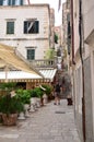 Tourists in Little tipical street in the old town of Dubrovnik