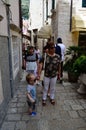 Tourists in Little tipical street in the old town of Dubrovnik