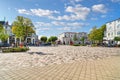 Tourists and local Germans enjoy a sunny day in the touristic main square of Old Town Warnemunde Rostock Germany