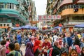 Hong Kong, crowded streets in Kowloon. Local inhabitants and tourists in streets of Kowloon with typical apartments in background. Royalty Free Stock Photo