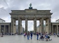 Tourists and local people at the Brandenburger Tor (Brandenburg Gate). Berlin, Germany.