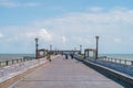Tourists and locals enjoy a nostalgic walk along the last remaining fully intact pier built for leisure