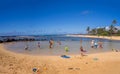 Tourists and locals enjoy Poipu Beach, Kauai Royalty Free Stock Photo