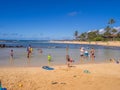 Tourists and locals enjoy Poipu Beach, Kauai Royalty Free Stock Photo