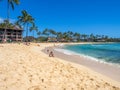 Tourists and locals enjoy Poipu Beach Royalty Free Stock Photo