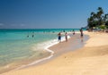 Tourists and locals on Lanakai beach on east coast of Oahu Royalty Free Stock Photo