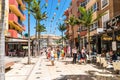 Tourists and locals shopping at the av. Blas Infante