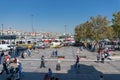 Tourists and locals at the square in front of New Mosque, with view of Eminonu